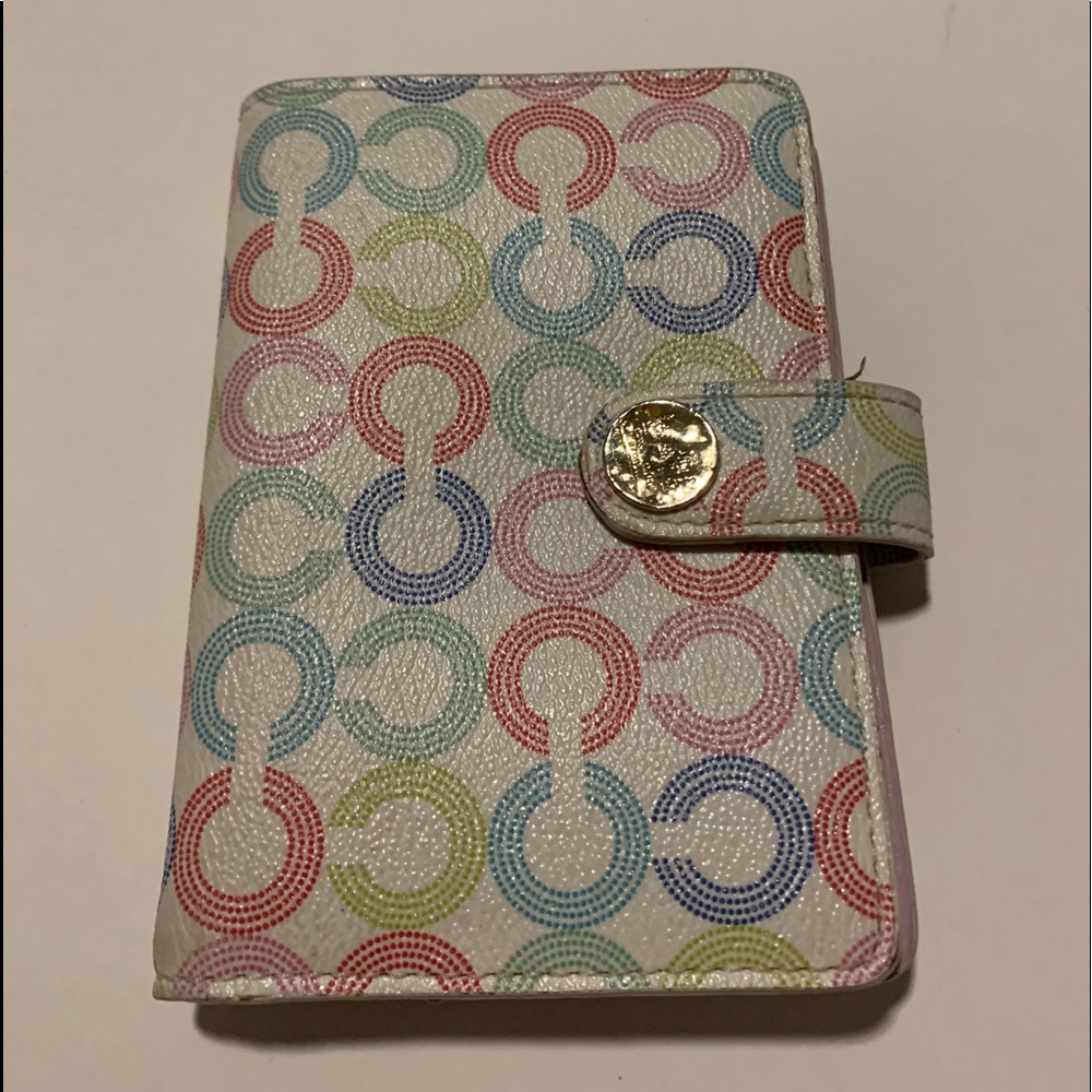 Signature Coach "C" multicolor wallet.